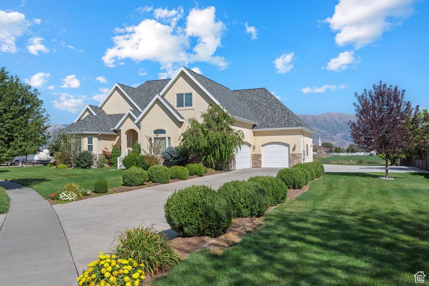 This home is a must see. Situated on the edge of a subdivision, the backyard offers a quiet retreat with an amazing view of the Wasatch mountains. Nestled in a friendly neighborhood this home is just minutes from restaurants, grocery stores, and other retailers. This home was built to impress with 18-foot ceilings in the oversized great room with an open floor plan into the kitchen, providing ample room for family gatherings and entertaining. Recent upgrades include a new roof and newer HVAC system, entertainment center, and RV parking. The walk-out basement features a patio with terraced landscaping. The basement also has a partially finished ADU with separate entrance. This addition will be great for multi-family living or rental income. Whether you're seeking a peaceful escape or an entertainer's dream, this one-of-a-kind home offers space, style, and versatility in a truly unforgettable setting.