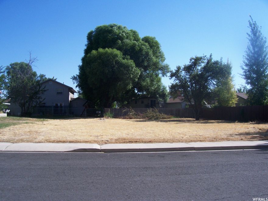 If you can't find the home of your dreams.  This large .22 lot is nested in a great quiet neighborhood close to everything. All ready to build on.