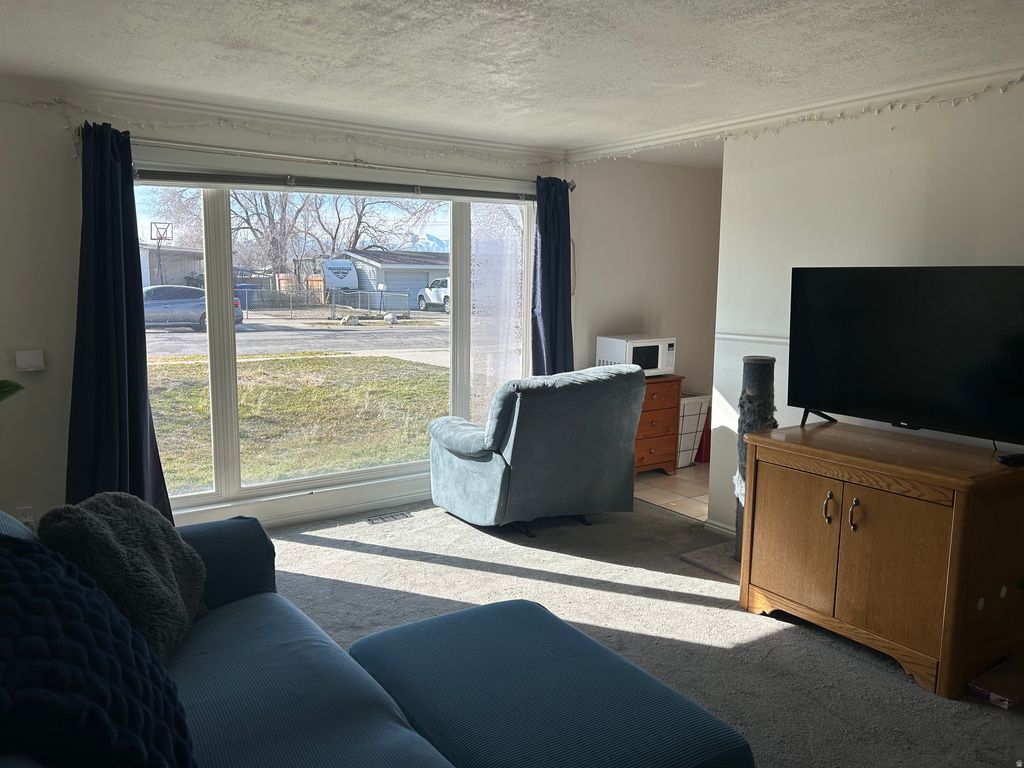 Photo of 1107 E SERPENTINE WAY S, Sandy, UT 84094 (MLS # 2134220)