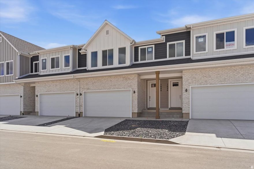 Brand new move in ready unit! Extremely large townhome with over 2700 SQ FT! 3 bedrooms, 2.5 bathrooms and an unfinished basement. Large family room with quality finishes including quartz countertops, soft close cabinets and stainless steel appliances. 9' tall main floor ceilings. Beautiful community with pickleball courts, playground and a dog park. Conveniently located close to shopping and the new West Davis Corridor. $15,000 incentive towards a rate buydown or closing costs using the preferred lender!