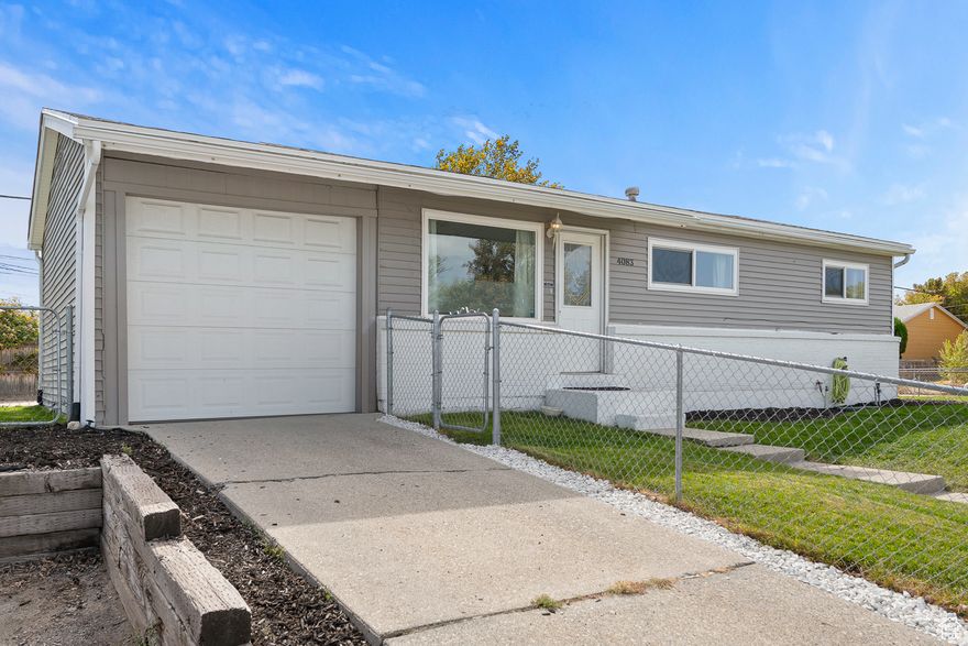 This well-maintained rambler offers 4 bedrooms and 2 bathrooms on a fully landscaped, fully fenced corner lot. The layout features abundant natural light, a spacious living room, and a kitchen with stainless steel appliances and soft-close cabinetry. New carpet (2024). Fully finished basement with two bedrooms, a large family room, cold storage, and a full bathroom. Exterior highlights include an open patio, attached one-car garage, and an extra uncovered parking area. Within walking distance of David Gourley Elementary and Kearns Jr. High.   Square footage figures are provided as a courtesy estimate only and were obtained from county records.  Buyer is advised to obtain an independent measurement.