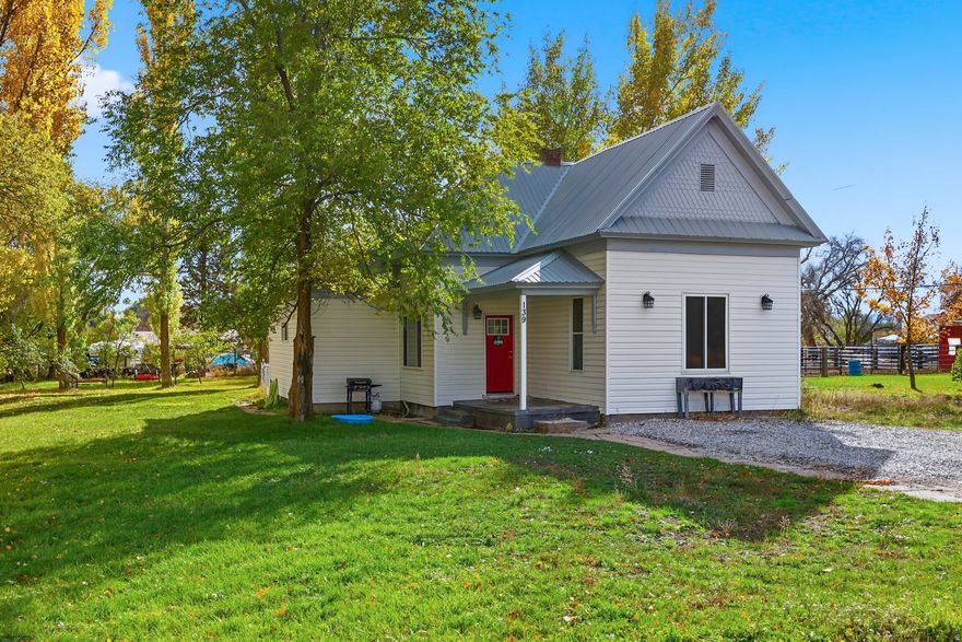 Cute and updated home in the heart of Preston! Features a newer metal roof, solar panels, and upgraded sewer and water main lines. Enjoy a fully fenced yard with a small single-car shed, fire pit, and mature plum and apple trees-perfect for pets and outdoor gatherings. Inside you'll find 3 bedrooms, 1 full bath, newer appliances, and charming updates throughout. An ideal starter home with great curb appeal and low utility costs!