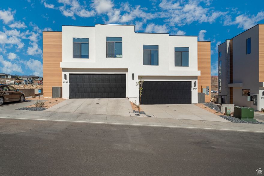 PRICE REDUCTION and a 2.99% interest rate with a 3-2-1 buydown when using the preferred lender. Just minutes from Sunbrook Golf Course, this beautiful 3-bedroom, 2.5-bath townhome combines modern comfort, quality construction, and stunning views of the Red Rocks and Pine Valley Mountains. Approved for 30+ day rentals, it's perfect as a primary home, vacation getaway, or investment. Enjoy nearby dining, shopping, and endless outdoor recreation in one of Southern Utah's most scenic settings. Photos shown are of a similar unit-colors and options may vary. Buyer to verify all information.