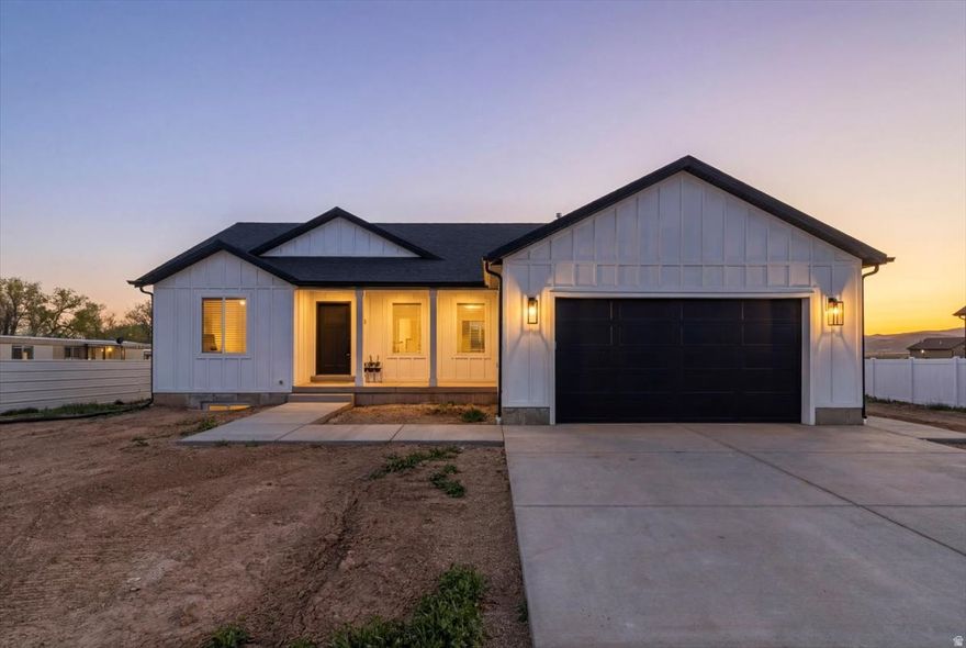 Built in 2025, (5 months old) this like-new home offers 2,900 sq ft with 3 bedrooms and 2 full bathrooms. The main level features an open floor plan with beautiful cabinetry, quartz countertops, and a fully equipped kitchen with all appliances included. The unfinished basement provides room for future expansion and customization to fit your needs. Situated on a .50-acre lot, the property includes a vinyl fence and offers scenic mountain views. Move-in ready with modern finishes and the benefits of new construction without the wait.