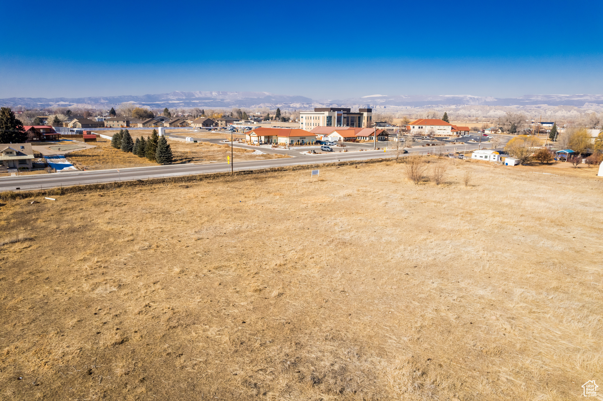 Great building potential with this parcel.The R-3 zoning in Uintah County, Utah is a residential zone for multi-family dwellings, but it also allows for some commercial uses. It's a transitional zone between commercial and residential areas. Currently there are no utilities connect to the property.  Utilities are easily accessible. Buyer to verify any and all information.