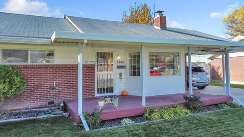 Photo of 7340 S COTTONWOOD ST W, Midvale, UT 84047 (MLS # 2121289)