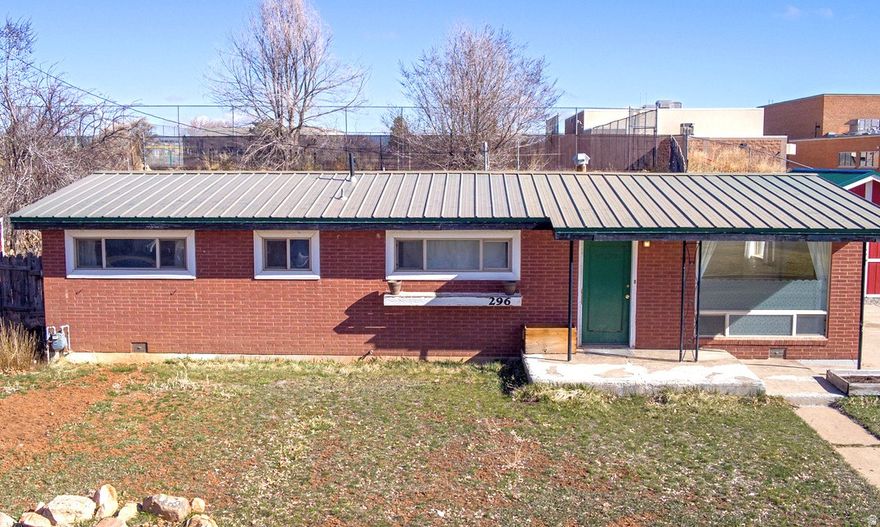 Move right in to this clean and cozy 3  bed 1 bath home. Located in a safe neighborhood with easy access to schools, churches, hospital, and shopping.  Sturdy metal roof!  Remodeled bathroom, newer windows, floor coverings, furnace, kitchen cabinets. One shed and one 320 sq ft (16x20) detached garage with 240v power.  The water and sewer lines from the street were recently replaced.