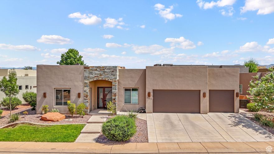LUXURY DESERT OASIS WITH $20K PRICE IMPROVEMENT + $5K SELLER CONCESSIONS! Meticulously upgraded 3BR/3.5BA plus attached casita in prestigious Dunes at Sand Hollow Resort. This 2,676 sq ft 2017 home showcases modern luxury with thoughtful upgrades throughout. EXCEPTIONAL FEATURES: Wood-look tile flooring for stunning aesthetics with easy maintenance, expansive sky deck with breathtaking panoramic views, built-in BBQ for outdoor entertaining, dual ovens and oversized pantry for serious cooks, Navian tankless water heater for endless hot water, energy-efficient gas furnace, Ecobee smart thermostats, premium Kinetico water softener & RO system, convenient central vacuum, Century Link Fiber capability for lightning-fast internet, custom garage storage systems. PLUS MORE!  The attached casita offers versatile space for guests, home office, or multi-generational living. Resort amenities at your doorstep with Sand Hollow's world-class recreation just minutes away.
