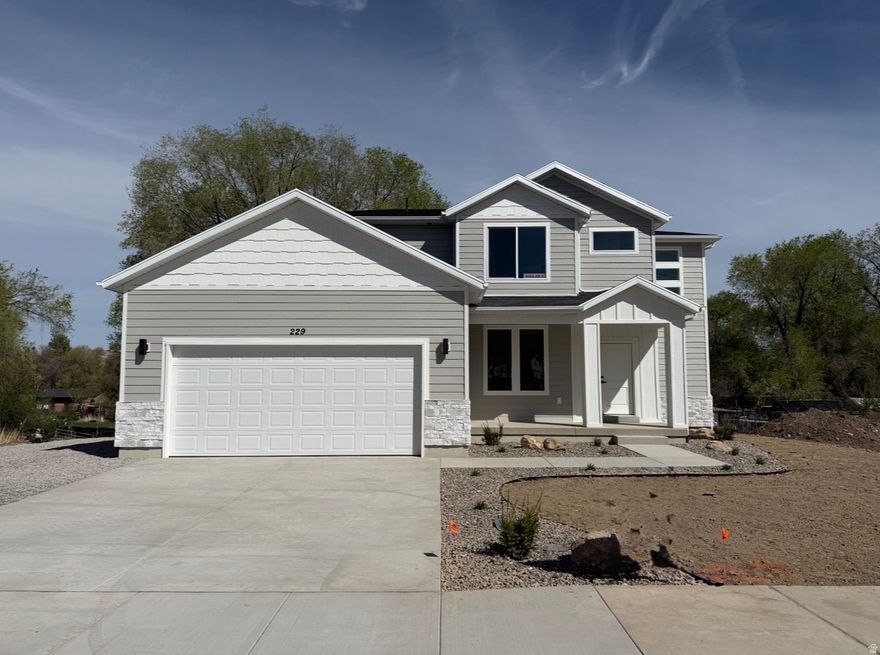 **This is one of nine available homes to come in this new beautiful Belle Hollow community! Feel free to inquire about any of the lots**Welcome to this BRAND NEW 4 bed 2.5 bath home set in the peaceful countryside of Payson, offering the perfect blend of modern design and quiet country living. The open main level features 9-foot ceilings, luxury vinyl plank flooring, and stylish finishes throughout. The kitchen showcases upgraded countertops, a gas range, and contemporary design ideal for everyday living and entertaining. The primary suite includes a spacious walk-in closet and a beautifully appointed bathroom with a freestanding shower. 3 additional bedrooms provide ample flexibility for family or guests. You can also enjoy the comforts of working from home with your own home office. Additional highlights include a tankless water heater and an attached 2-car garage. This home offers comfort, style, and low-maintenance living in a beautiful setting. You won't want to miss it! **NOTE: All interior photos are from a different home in the same neighborhood with the same floor plan**