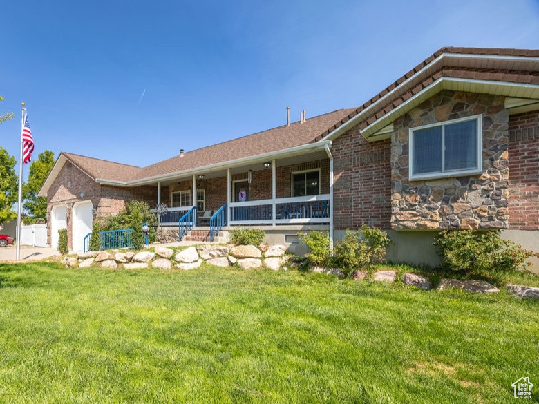This exceptional horse property backs onto a tranquil, tree-lined creek and features a beautifully maintained pasture perfect for equestrian lovers. A spacious hay barn and well-equipped shop offer endless possibilities for hobbies, storage, or agricultural needs. This home is filled with thoughtful upgrades and updated finishes, including rich Hickory hardwood floors, a striking rock fireplace, and permanent holiday outdoor lighting for year-round charm. Enjoy expansive, warm living spaces designed for comfort and functionality. With a second kitchen and private entrance, the lower level is ideal for a mother-in-law suite, guest quarters, or a potential income-producing ADU. Whether you're looking for multi-generational living or space to spread out, this property delivers the perfect balance of rural serenity and modern convenience.