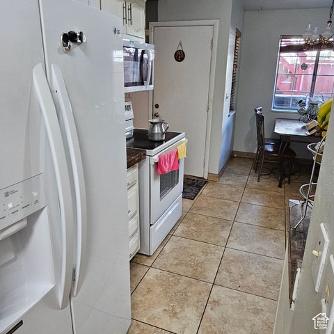 Tiny photo for 1924 W HOMESTEAD FARMS LN #4, West Valley City, UT 84119 (MLS # 2189899)