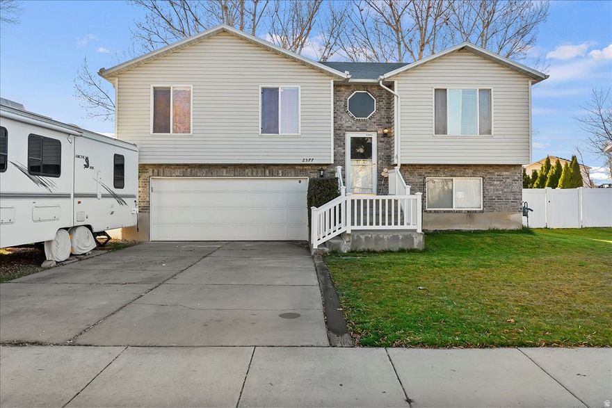 THIS BEAUTIFUL HOME FEATURES A GORGEOUS, SPACIOUS BACKYARD PERFECT FOR RELAXING OR ENTERTAINING. INSIDE, TWO GAS FIREPLACES ADD WARMTH AND CHARM, WHILE A LARGE DECK EXTENDS THE LIVING SPACE OUTDOORS. THE PROPERTY INCLUDES AN RV PAD AND IS CONVENIENTLY LOCATED CLOSE TO LOCAL AMENITIES, OFFERING BOTH COMFORT AND CONVENIENCE.