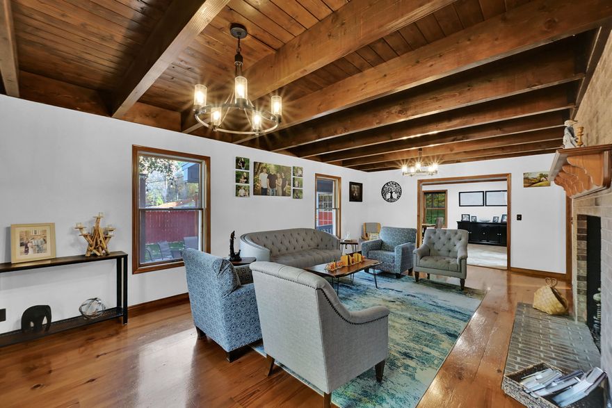 Tucked away in the highly desirable Hidden Village on the Island neighborhood, this beautiful 5-bedroom, 4-bath home offers the perfect balance of space, comfort, and charm across approximately 3,692 square feet. Situated on a generous 0.34-acre lot, the property features an inviting formal living area with a classic brick fireplace, a dedicated home office, and multiple outdoor spaces ideal for entertaining-including a spacious deck and patio surrounded by mature landscaping. Enjoy a prime location close to schools, parks, and shopping, while still savoring the peaceful, tucked-away feel that makes this neighborhood so special. Square footage figures are provided as a courtesy estimate only and were obtained from county records. Buyer is advised to obtain an independent measurement.