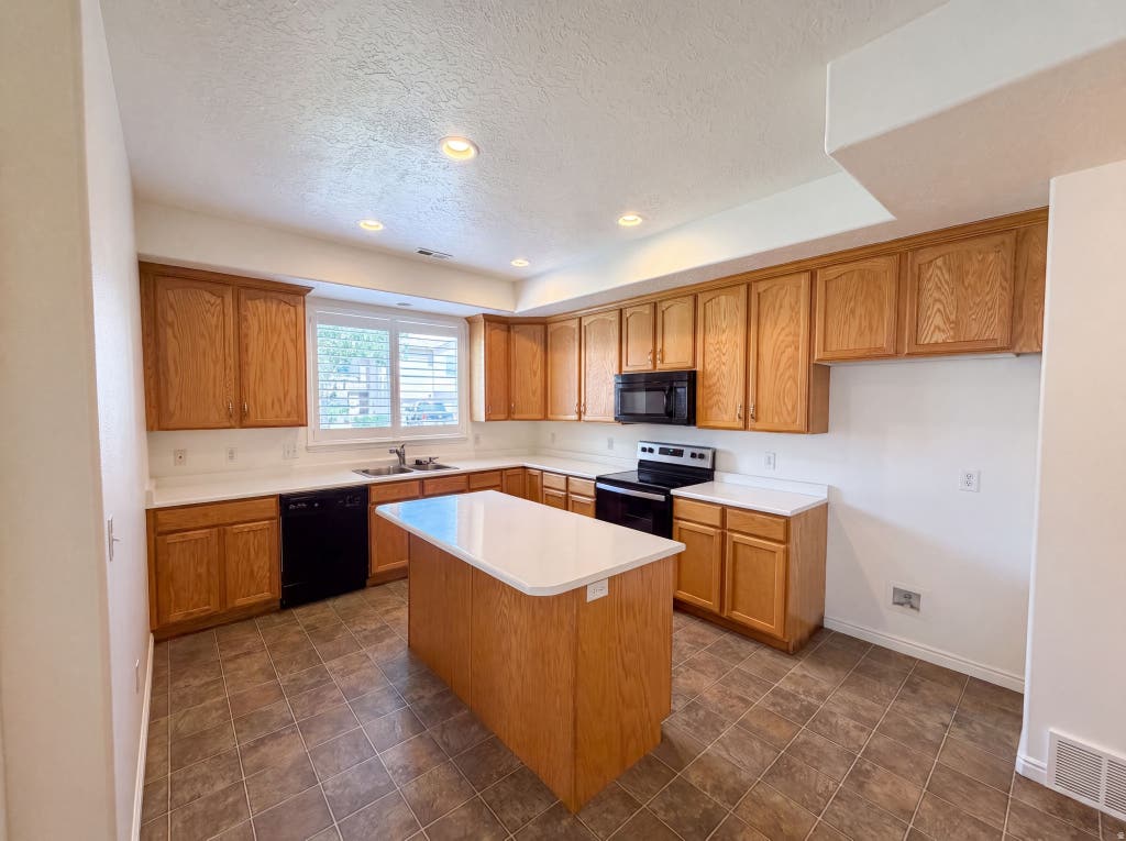Photo of 6943 W BAMBURGH WAY, West Valley City, UT 84128 (MLS # 2175663)