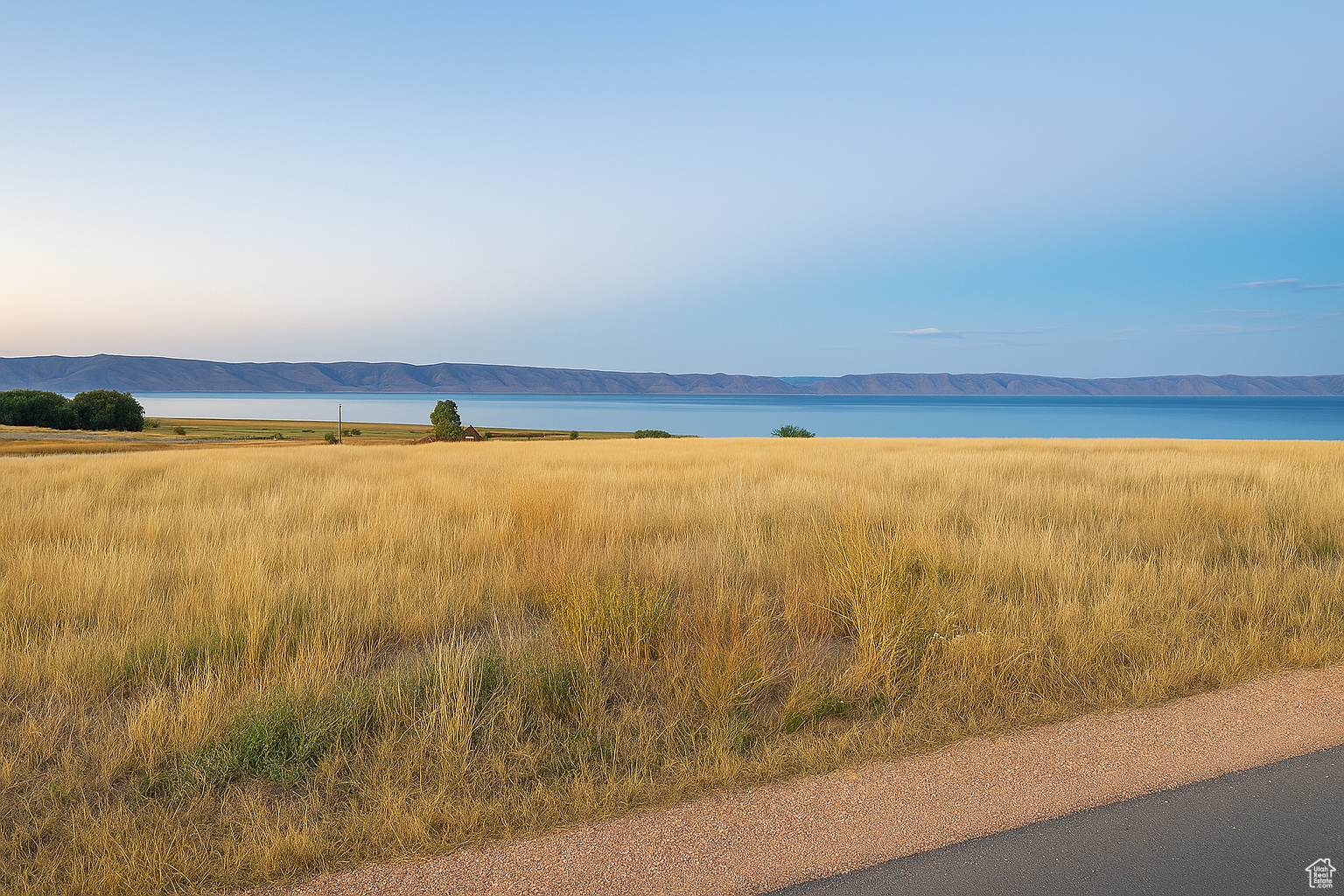 Build your dream retreat in The Reserve at Fish Haven, one of Bear Lake's most sought-after gated communities. This spacious lot offers breathtaking views of turquoise Bear Lake and the surrounding mountains, with direct access to miles of trails for hiking, ATV, and snowmobiling. Enjoy private community amenities including a clubhouse, pool, pickleball/multipurpose court, and private beach access - perfect for year-round recreation and relaxation. Whether you're envisioning a vacation home, investment property, or full-time residence, this property combines natural beauty, privacy, and resort-style amenities in an unbeatable setting. reservebl.com Information deemed reliable buyer to verify.