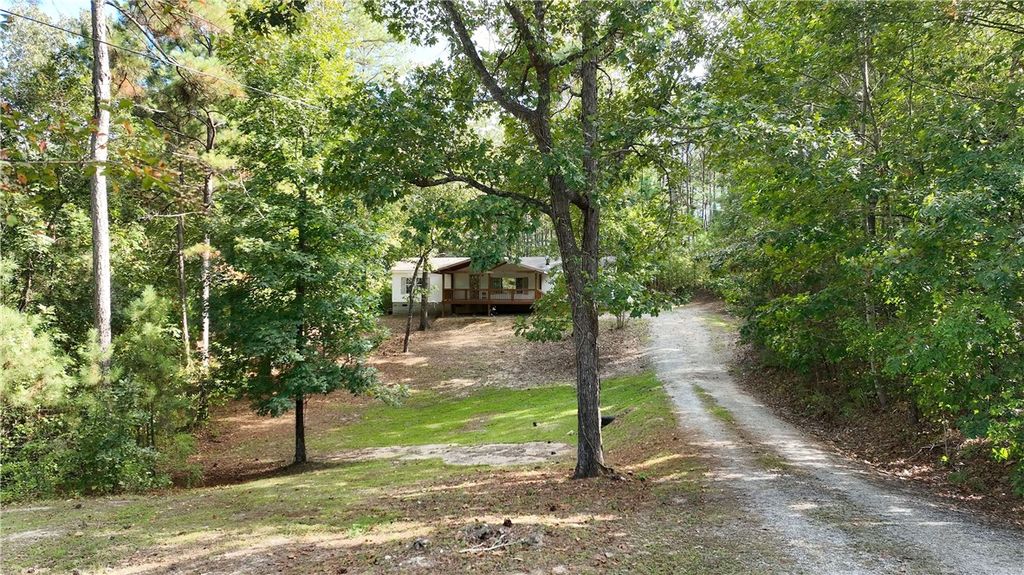 Photo of 795 PECKERWOOD Road, Jacksons Gap, AL 36861 (MLS # 177034)