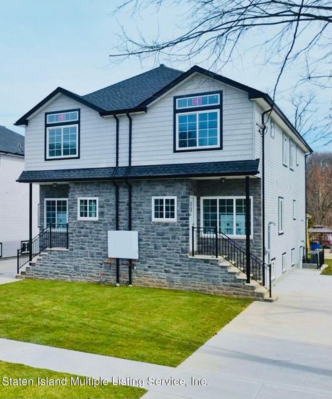 Photo of 365 Poillion Avenue, Staten Island, NY 10312 (MLS # 2401370)