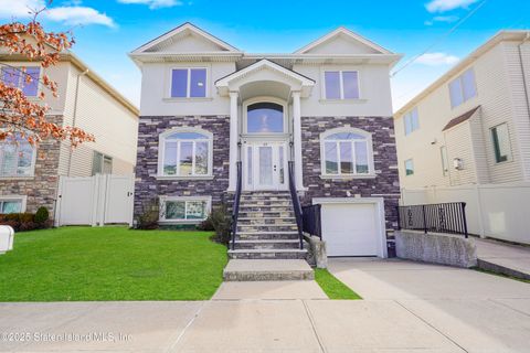 Photo of 63 Enfield Place, Staten Island, NY 10306 (MLS # 2502111)