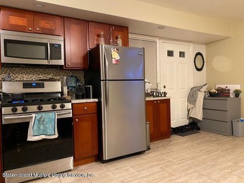 Photo of 62 Corona Avenue, Staten Island, NY 10306 (MLS # 1165067)