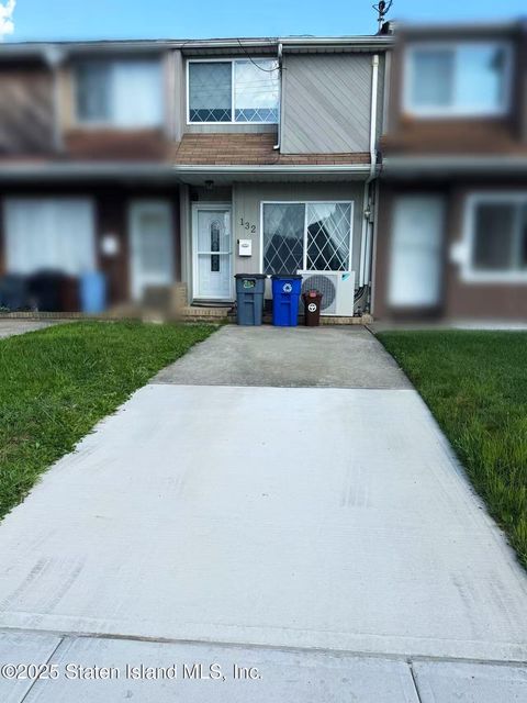 Photo of 132 Milton Avenue, Staten Island, NY 10306 (MLS # 2503705)