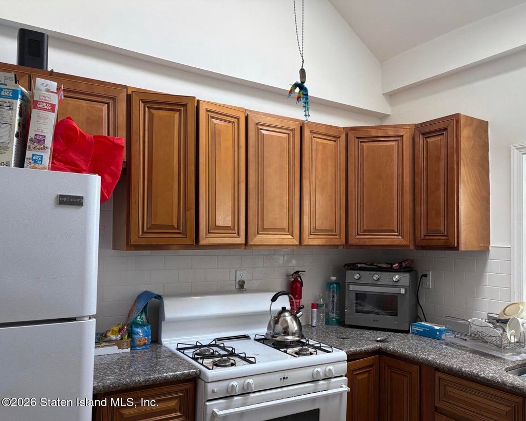 Photo of 750 Patterson Avenue, Staten Island, NY 10306 (MLS # 2605675)