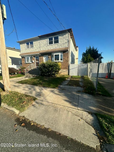 Photo of 528 Riga Street, Staten Island, NY 10306 (MLS # 2406003)