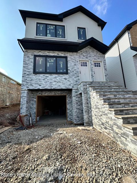 Photo of 66 Ebony Street, Staten Island, NY 10306 (MLS # 1158768)