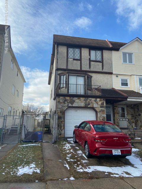 Photo of 574 Travis Avenue, Staten Island, NY 10314 (MLS # 2500215)