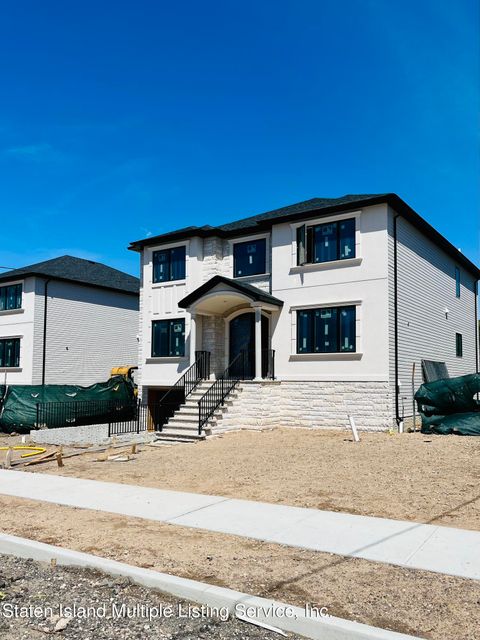 Photo of 45 Center Street, Staten Island, NY 10306 (MLS # 1158329)