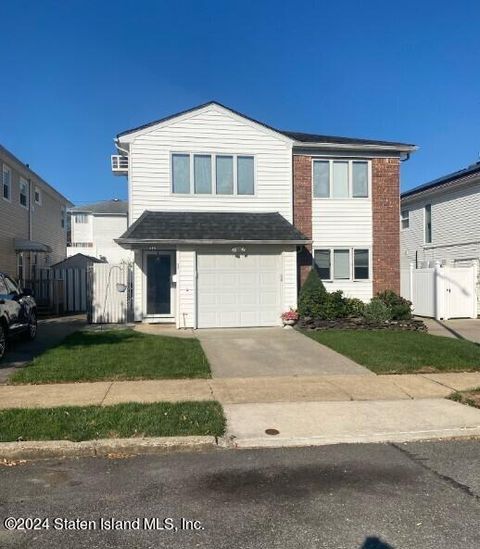 Photo of 408 Getz Avenue, Staten Island, NY 10312 (MLS # 2404979)