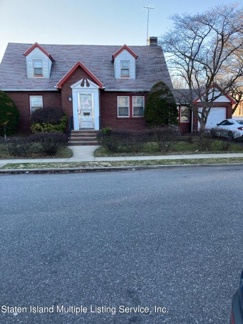 Photo of 469 Clawson Street, Staten Island, NY 10306 (MLS # 1160400)