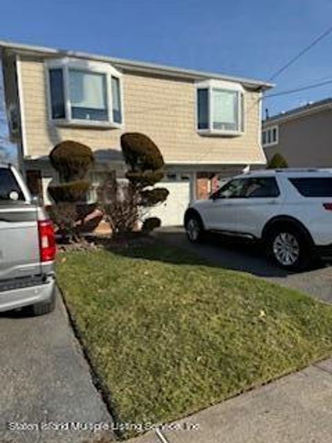 Photo of 104 Amsterdam Avenue, Staten Island, NY 10314 (MLS # 2400648)