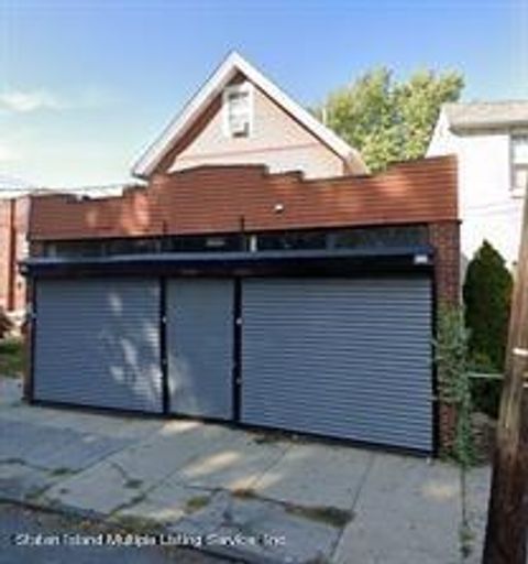 Photo of 943 Castleton Avenue, Staten Island, NY 10310 (MLS # 1163123)