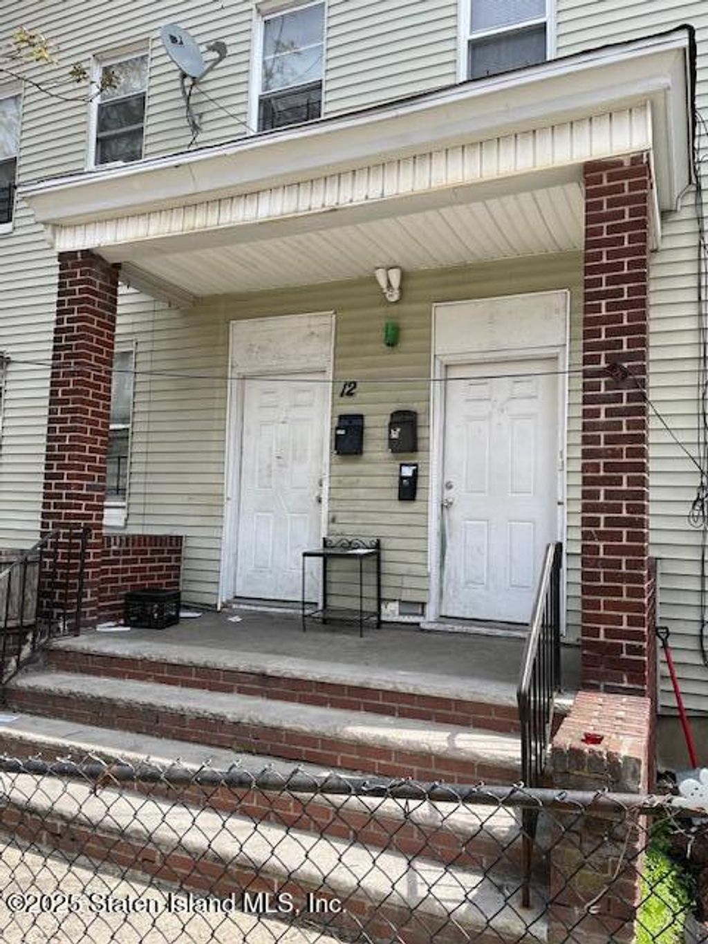 Photo of 12 Castleton Avenue, Staten Island, NY 10301 (MLS # 2500827)