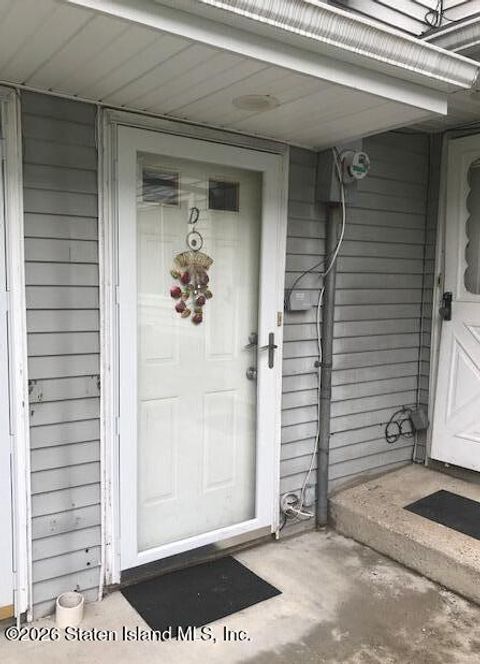 Photo of 126 Cassidy Place #D, Staten Island, NY 10301 (MLS # 2601790)