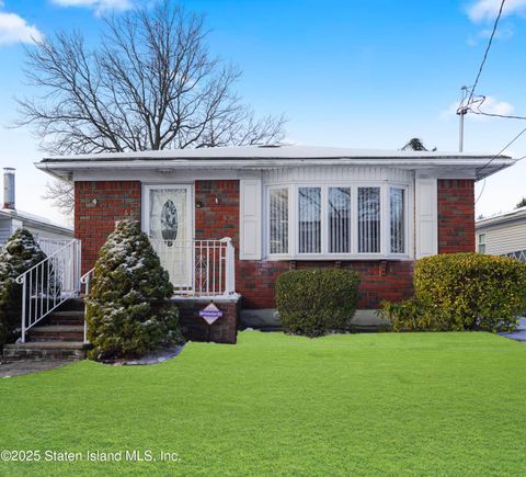 Photo of 160 Woods Of Arden Road Rd, Staten Island, NY 10312 (MLS # 2500701)