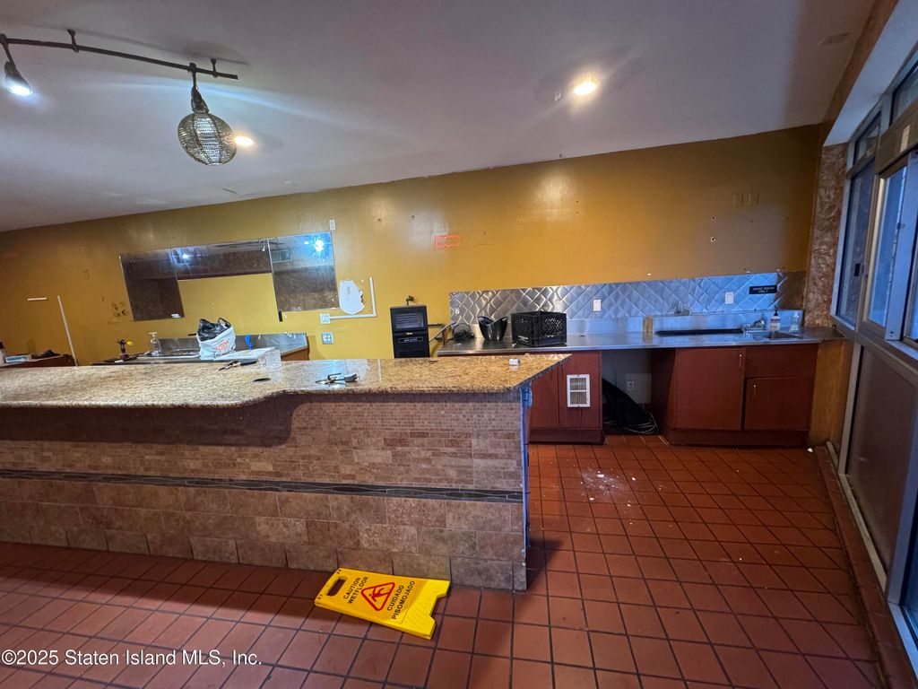 Photo of 1144 Hylan Boulevard, Staten Island, NY 10305 (MLS # 2506577)