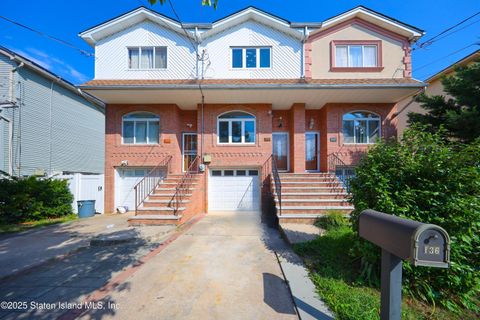Photo of 136 Moreland Street, Staten Island, NY 10306 (MLS # 2505282)