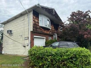 Photo of 563 Foster Road, Staten Island, NY 10309 (MLS # 2603760)