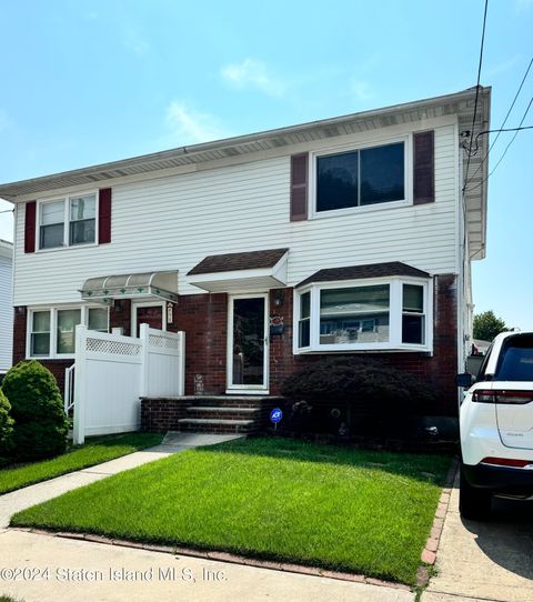 Photo of 102 Belfast Avenue, Staten Island, NY 10306 (MLS # 2405149)