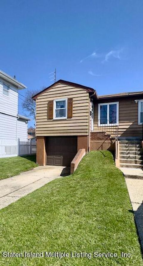 Photo of 221 Midland Avenue, Staten Island, NY 10306 (MLS # 2401694)