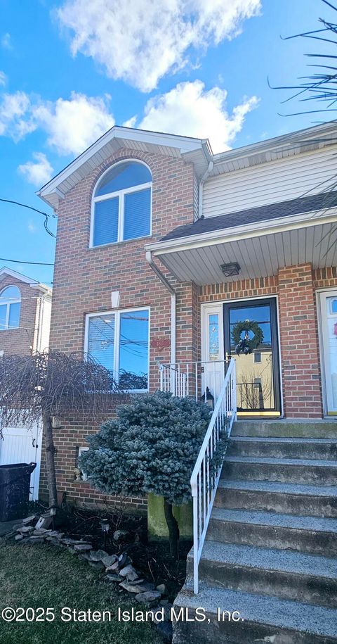 Photo of 480 Riga Street, Staten Island, NY 10306 (MLS # 2500541)