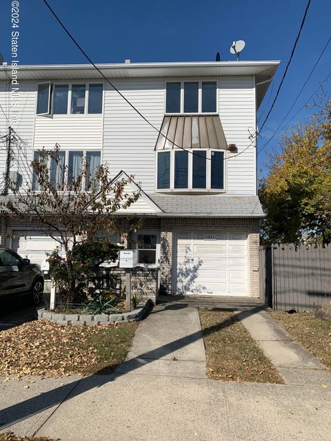 Photo of 1041 Father Capodanno Boulevard, Staten Island, NY 10306 (MLS # 2406129)