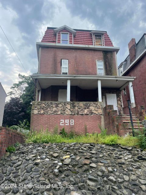 Photo of 298 St Marks Place, Staten Island, NY 10301 (MLS # 2404518)