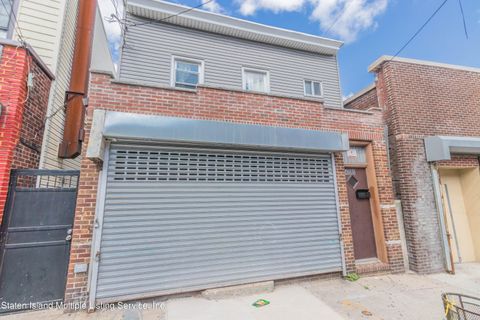 Photo of 400 Jersey Street, Staten Island, NY 10301 (MLS # 2406276)