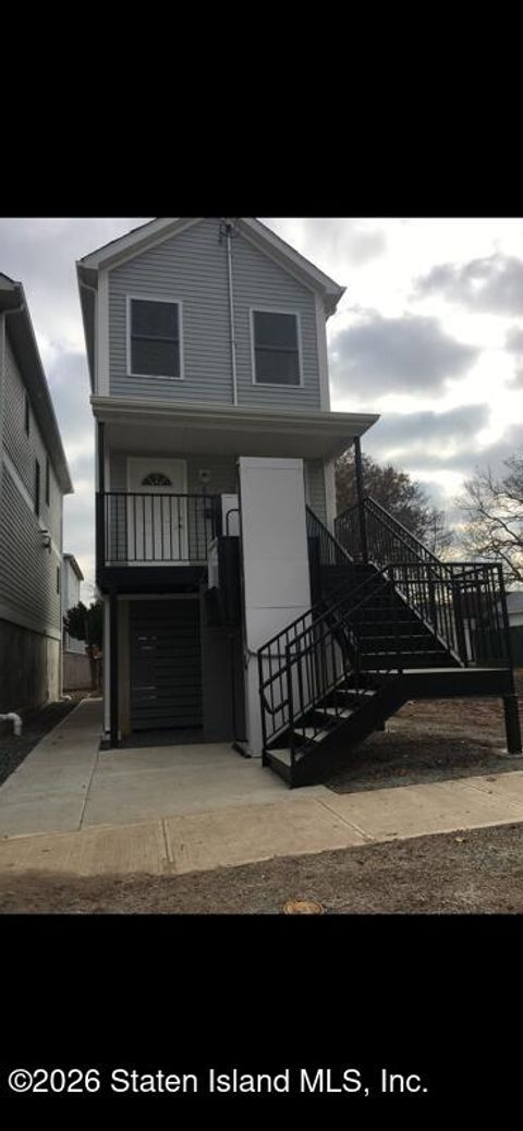 Photo of 822 Nugent Avenue, Staten Island, NY 10306 (MLS # 2602012)