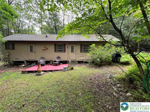 Photo of 255 Buck Fever Trail, Pocono Twp, PA 18355 (MLS # 761006) Photo of 255 Buck Fever Trail, Pocono Twp, PA 18355 (MLS # 761006)