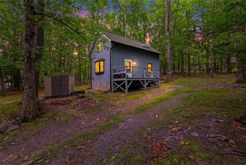 Photo of 180 E Shore Drive, Delaware Twp, PA 18328 (MLS # 779058)