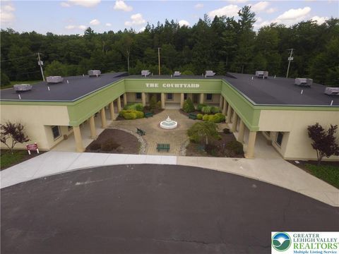 Photo of 300 Community Drive, Coolbaugh Twp, PA 18466 (MLS # 768025)