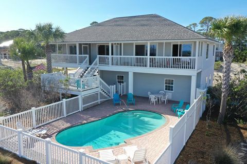 Photo of 701 E Gulf Beach Dr, Saint George Island, FL 32328 (MLS # 324181)